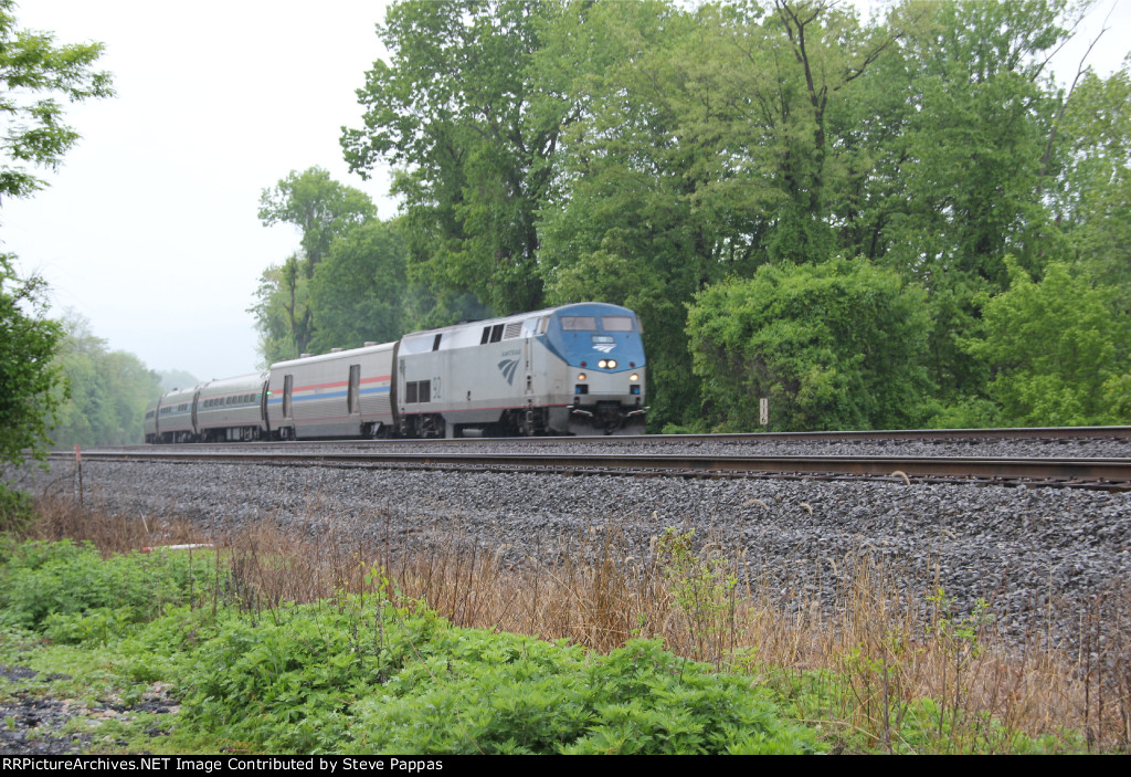 Amtrak 92 heads east with train 42 at milepost 116